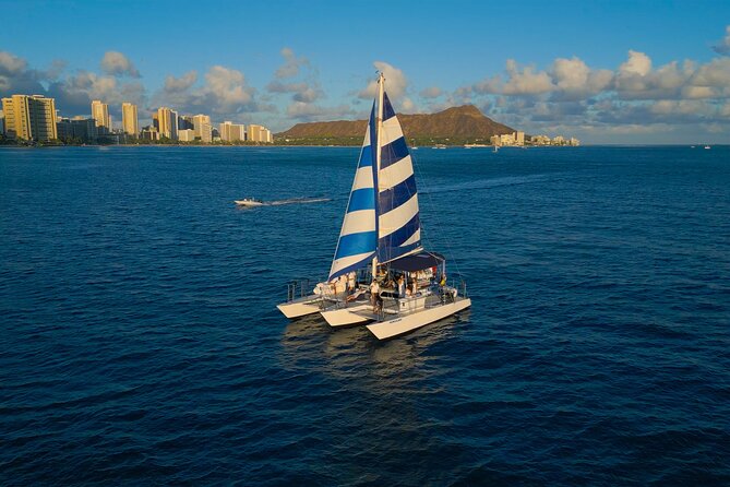 Best Waikiki Sunset Cruise:BYOB Sunset Sail with Swimming - The crew, the music, and the small-boat feel (especially for non-drinkers)