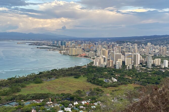 Diamond Head Hiking Tour with Ticket and Reservation Inclusion - The Diamond Head State Monument climb: moderate, step-heavy, and worth it