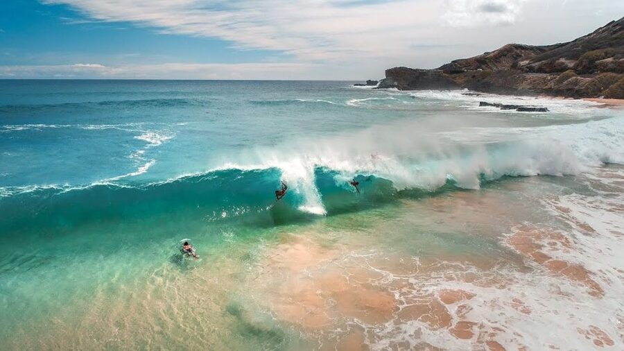 From Waikiki: Circle Island Tour - North Shore and ocean stops: Banzai Pipeline, Sharks Cove, and the blowhole moment
