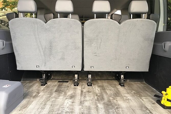 Honolulu Airport & Waikiki Hotels Private Transfer by Passenger Van(up to 14ppl) - Optional Orchid Lei Greeting: When $15 Per Person Feels Worth It