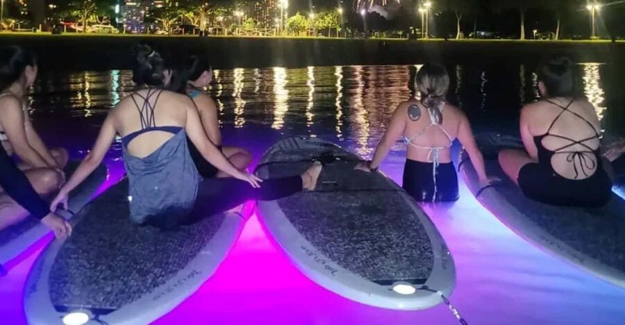 Honolulu: Fireworks Glow and Flow Yoga Class - Getting set up: SUP board, LED lights, and a calm start