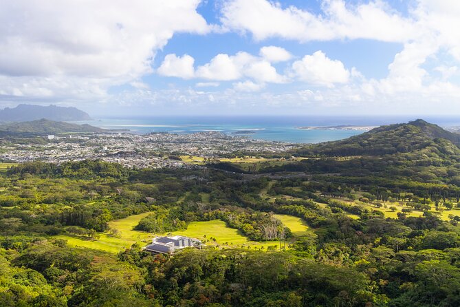 Oahu Grand Circle Island and Haleiwa Tour: 9-Hr Deluxe Experience - Diamond Head and surfing beaches: window views that still matter