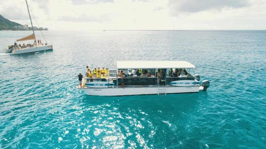 Oahu Snorkeling with Turtles, Water Scooter, Paddleboard - Getting to the water: Waikiki pick-up and the catamaran cruise