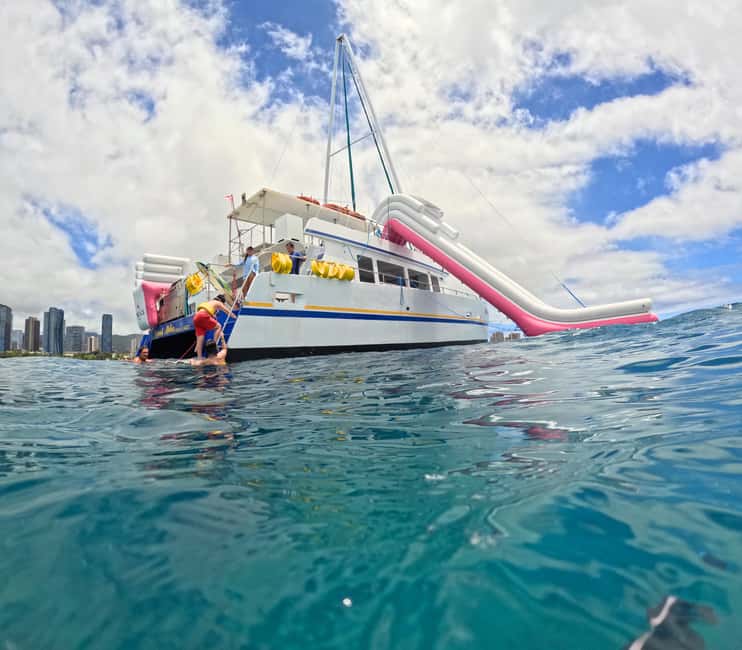 Waikiki: Snorkeling & Ocean Playground Experience - Deck Time, Shade, Snacks, and the Small Comfort Wins